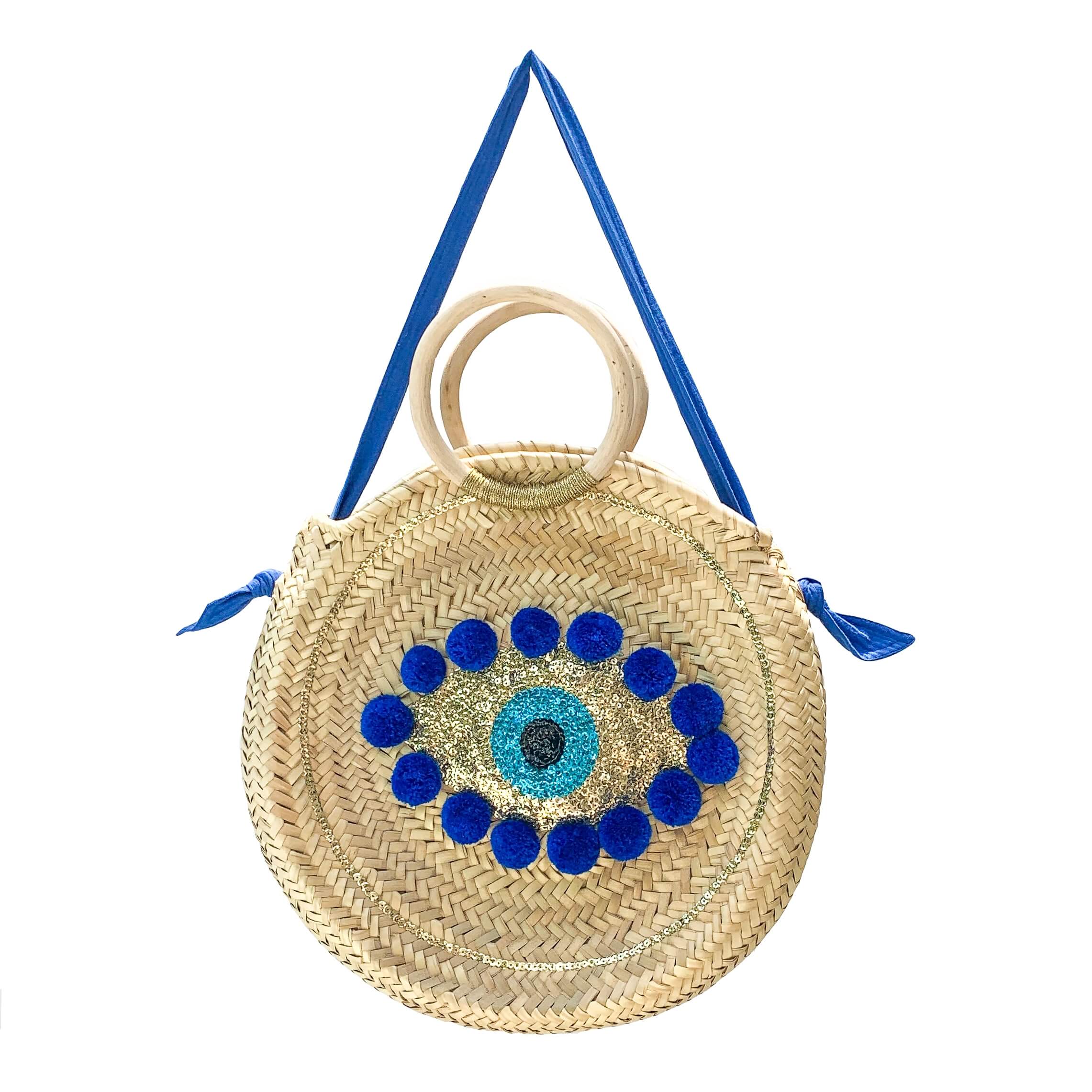 A Petit Nomade bag featuring an Evil Eye design.