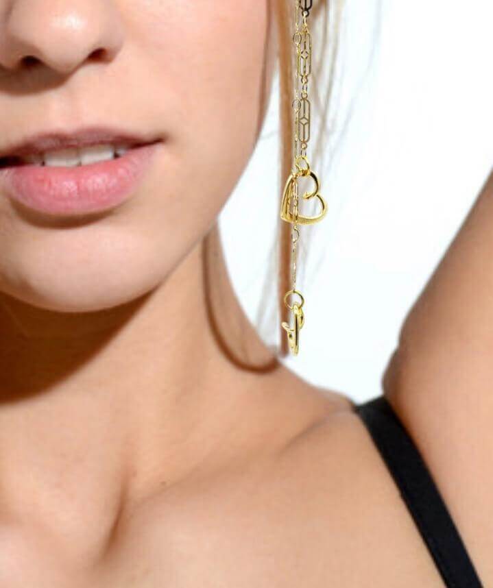 Gold heart earrings designed by Jamie Batiste of Rejected Hearts Club.