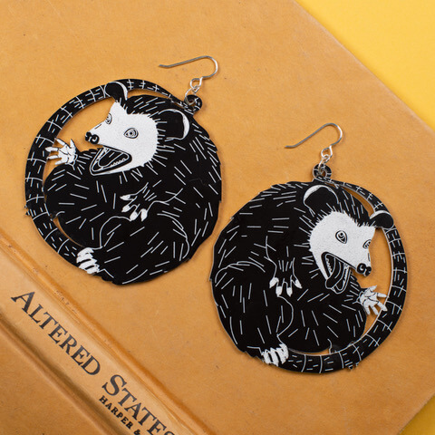 Black and white possum earrings. Darling Marcelle offers unique jewelry designs.