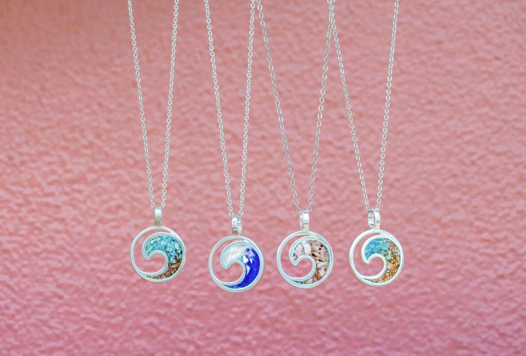 Four pendant necklaces by Dune Jewelry. 